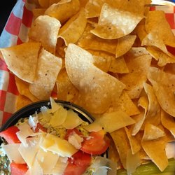 Hott Wings - Spinach Artichoke dip. Comes with Chip's, celery, and carrots.