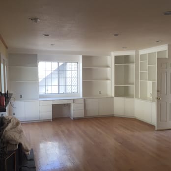 Exotic Construction - empty living room with built in bookcases - General Contractors Near Me - San Jose, California