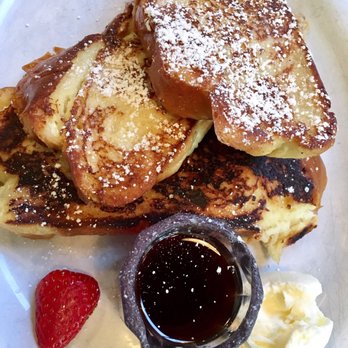 Rick & Ann's Restaurant - ERICA'S FRENCH TOAST - $8.75 (Reg. stack) - Challah bread dipped in orange-cardamom batter. - Breakfast & Brunch Near Me - Berkeley, California Rick & Ann's Restaurant - ERICA'S FRENCH TOAST - $8.75 (Reg. stack) - Challah bread dipped in orange-cardamom batter. - Breakfast & Brunch Near Me - Berkeley, California