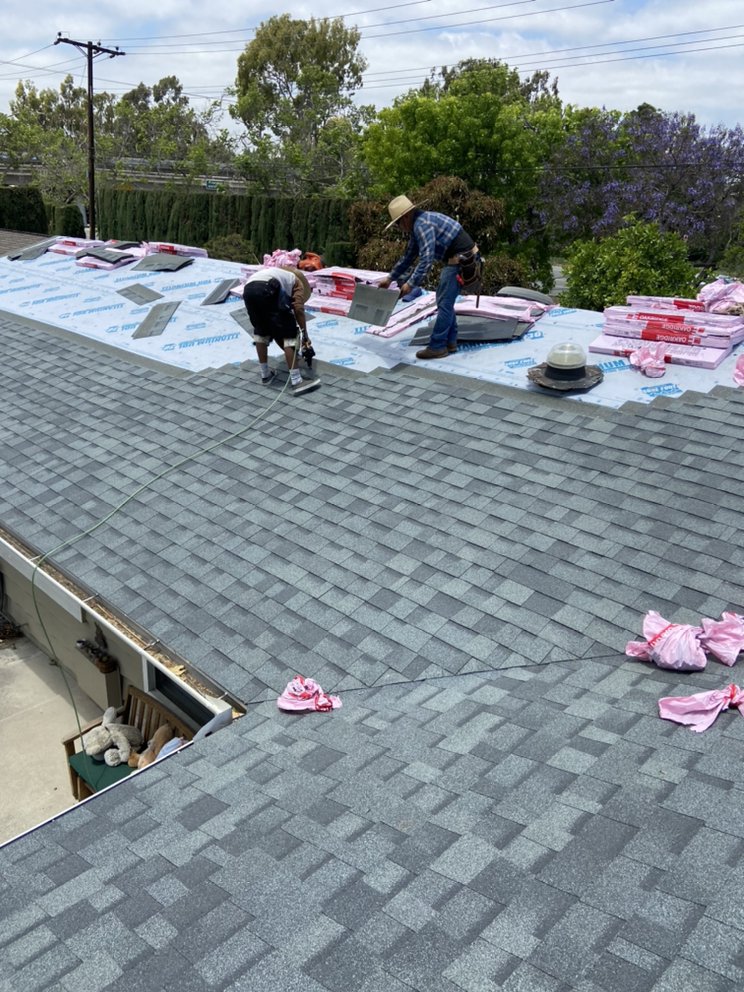 Slide of Green Shield Roofing