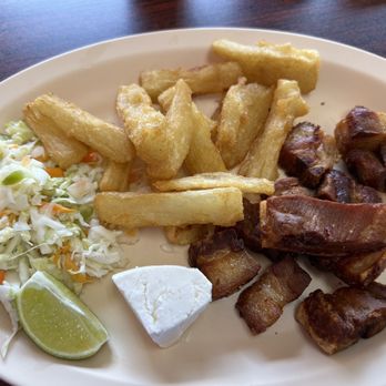 Latin Flavor - Fried Yuca with Chicharron - Salvadoran Near Me - Plantation, Florida Latin Flavor - Fried Yuca with Chicharron - Salvadoran Near Me - Plantation, Florida