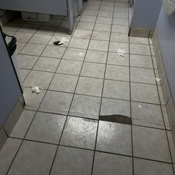 Shell - Broken dirty tile... trip hazard!