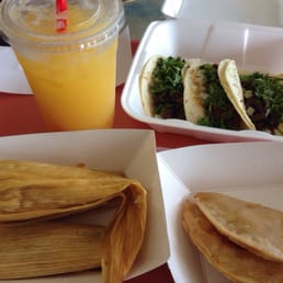 Tacos, mango drink, empanadas and tamales. Tacos, mango drink, empanadas and tamales.