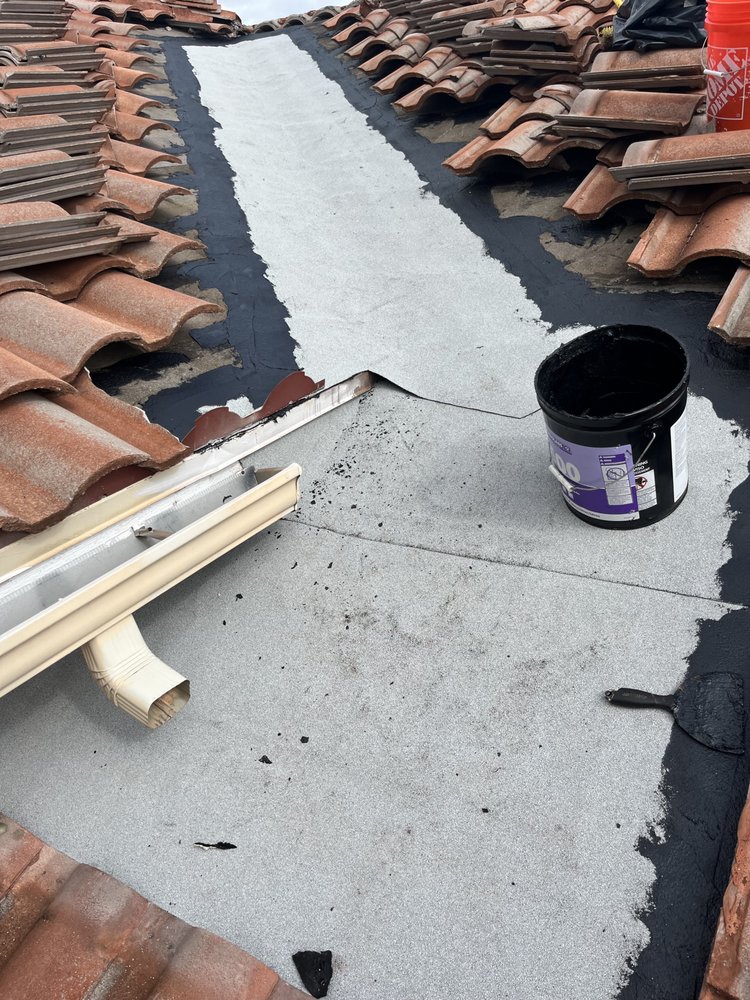 Slide of Francis Roofing Solutions