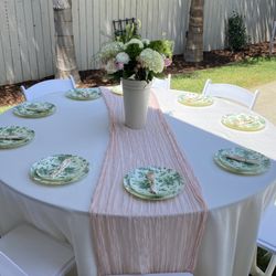 Azul Event Rentals - 66" table and white resin chairs.