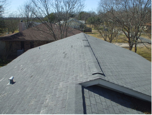 Slide of Ruddy's Roofing