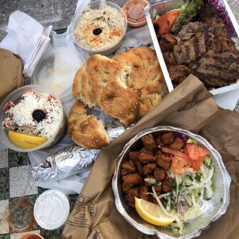 Aksaray Turkish Cafe Restaurant - Summer dinner: liver, small shepherds salad, mixed grill, babaghanous, Turkish bread, complementary tomato sauce and yogurt - Coffee & Tea Near Me - Brooklyn, New York