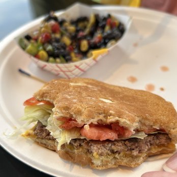 Bobo's Deli And Grill - This is their cheeseburger. Beef patty about as thin as the slice of tomato and cheese almost non-existent. - American Near Me - Winston Salem, North Carolina