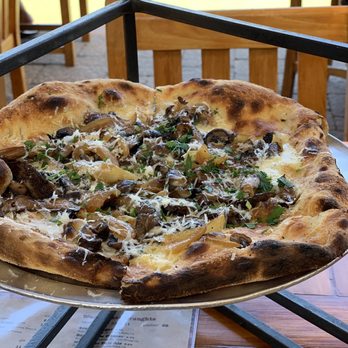 Bar Bocce - The mushroom pizza was delish ! I couple next to me offered me a cod ball  great vibez ! They were getting ready a Marathon - Pizza Near Me - Sausalito, California
