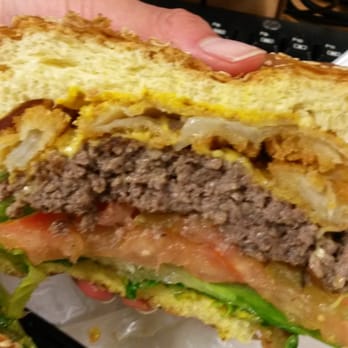 Stanton's City Bites - Truck stop, bacon on the side, so good. Look at that huge patty and onion rings! - Burgers Near Me - Houston, Texas Stanton's City Bites - Truck stop, bacon on the side, so good. Look at that huge patty and onion rings! - Burgers Near Me - Houston, Texas