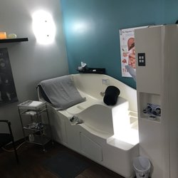 Monkey Tree Health - Our treatment room is warm and welcoming filled with soft lighting and diffused essential oils.