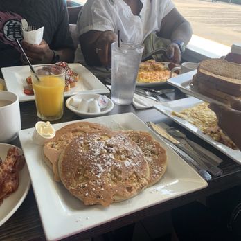 Adams Restaurant & Catering - Banana nut hot cakes with bacon and tea - New American Near Me - Wildwood, New Jersey Adams Restaurant & Catering - Banana nut hot cakes with bacon and tea - New American Near Me - Wildwood, New Jersey