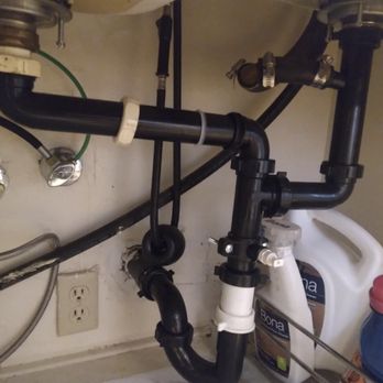 Roland's Handyman Services - a kitchen sink under the sink - General Contractors Near Me Roland's Handyman Services - a kitchen sink under the sink - General Contractors Near Me