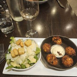 Girl dinner = side ceaser and crab hush puppies. And white wine.