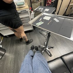Flying Daggers Tattoo Parlor