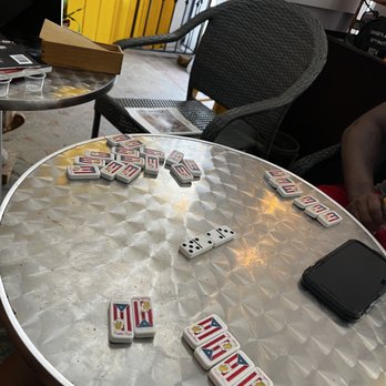 Don Collins - Table settings with dominoes. - Tobacco Shops Near Me - San Juan, Puerto Rico Don Collins - Table settings with dominoes. - Tobacco Shops Near Me - San Juan, Puerto Rico