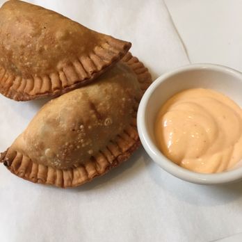 Persimmon Restaurant - Empanadas not to trifled with. Flaky as a lobbyist. - New American Near Me - Bethesda, Maryland