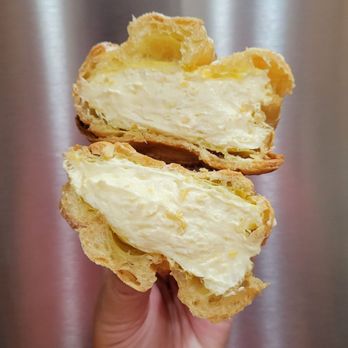 Beard Papa’s - Plain shell with mango filling cut in half - Desserts Near Me - Concord, California Beard Papa’s - Plain shell with mango filling cut in half - Desserts Near Me - Concord, California