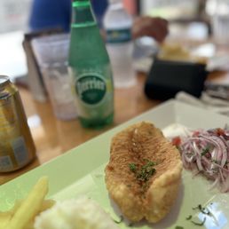 Fresh fish, white rice, onions, and fried yuca. GrandSlam absolutely delicious.