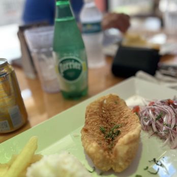 561Ceviche - Fresh fish, white rice, onions, and fried yuca. GrandSlam absolutely delicious. - Peruvian Near Me - Royal Palm Beach, Florida