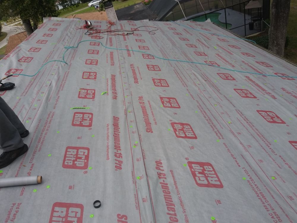 Slide of Saranovic & sons roofing