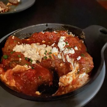 Postino 9CO - Meatballs with goat cheese.  Request a couple pieces of bread and spoon to enjoy the sauce. - Wine Bars Near Me - Denver, Colorado