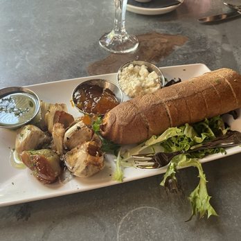 La Grande Martier - Gluten free baguette and roasted garlic appetizer with pesto feta and apricot jelly - New American Near Me - Stuart, Florida La Grande Martier - Gluten free baguette and roasted garlic appetizer with pesto feta and apricot jelly - New American Near Me - Stuart, Florida