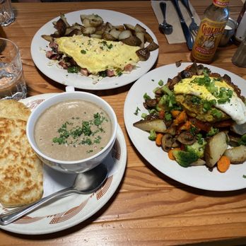 The Dizzy Hen - Ham, Mushroom, and Cheddar Omelet  Veggie Hash with curried lentil cake (and an optional fried egg on top)  Creamy Mushroom Soup - Breakfast & Brunch Near Me - Philomath, Oregon