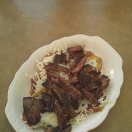 This is appetizer. They are tostones with cheese amd I added the beef, which was really tasty. This is appetizer. They are tostones with cheese amd I added the beef, which was really tasty.