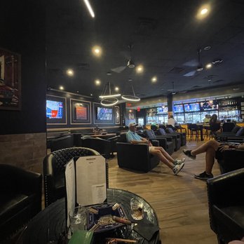 Castros Cigar Lounge - people relaxing in lounge chairs - Cigar Bars Near Me - Phoenix, Arizona