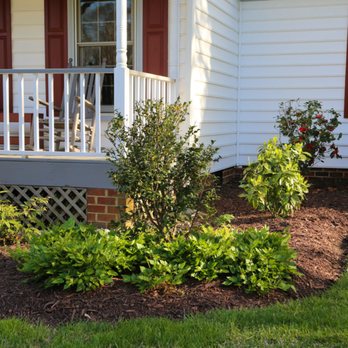 Snipes Lawn & Landscaping - a front porch with a porch railing - Landscape Architects or Designers Near Me - Chesapeake, Virginia Snipes Lawn & Landscaping - a front porch with a porch railing - Landscape Architects or Designers Near Me - Chesapeake, Virginia