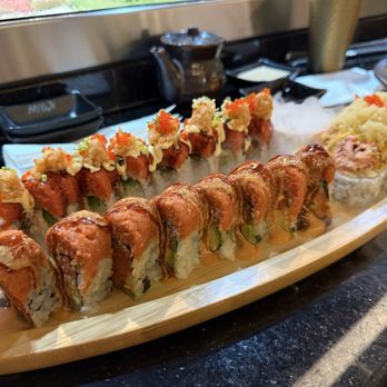 Miyaji - Florida roll (back), yummy roll (front), volcano roll (right) - Japanese Near Me - Lake Mary, Florida Miyaji - Florida roll (back), yummy roll (front), volcano roll (right) - Japanese Near Me - Lake Mary, Florida