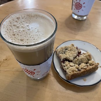 Small World Coffee - Raspberry Crumble Bar + Oat milk latte - Coffee & Tea Near Me - Princeton, New Jersey Small World Coffee - Raspberry Crumble Bar + Oat milk latte - Coffee & Tea Near Me - Princeton, New Jersey