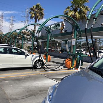 Quick Quack Car Wash - Socially distancing ourselves while tidying up the interior, post-wash - Car Wash Near Me - Millbrae, California Quick Quack Car Wash - Socially distancing ourselves while tidying up the interior, post-wash - Car Wash Near Me - Millbrae, California