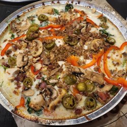 No Doh (Parmesan & Spinach base) White Out with added fresh mushrooms, Jalapeños, bacon, sausage crumbles, and red peppers.