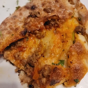 Farrelli's Pizza - The meatlovers calzone cut open, dry - Pizza Near Me - Ruston, Washington