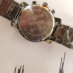 Heirloom Engravers - Mommy and Baby heartbeats on the new Daddy's watch.