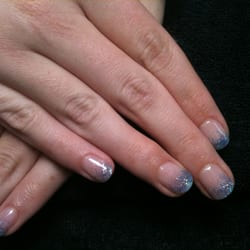 Evolution Salon & Spa - Light blue ombré gel nail