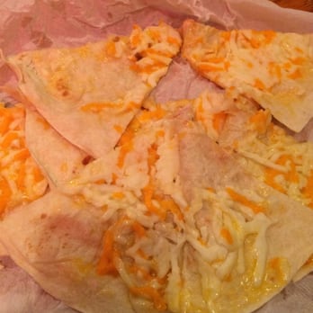 Gramma's Kitchen & Checkered Flag - Some uncooked quesadillas that came with my salad. - Breakfast & Brunch Near Me - Walcott, Iowa