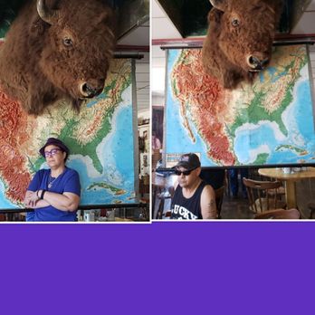 Ok Cafe - Me & my hubby under the famous Buffalo at the Ok Cafe - American Near Me - Tombstone, Arizona