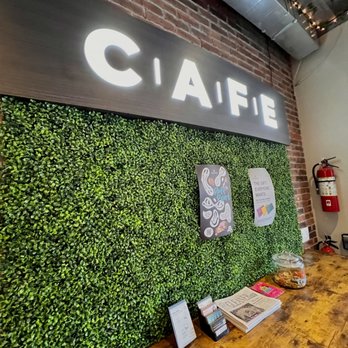 CAFE Dispensary - a wall of plants - Coffee & Tea Near Me - Toronto, Ontario CAFE Dispensary - a wall of plants - Coffee & Tea Near Me - Toronto, Ontario