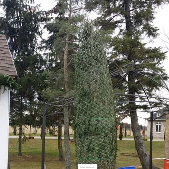 Kennedy Garden Center - a christmas tree in the yard - Landscaping Near Me - Caledon, Ontario Kennedy Garden Center - a christmas tree in the yard - Landscaping Near Me - Caledon, Ontario