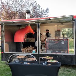 Red Ember Pizza - Their awesome set up! Came prepared with everything to serve the pizza too!