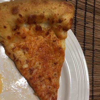 Pizza Hut - a slice of pizza on a plate - Pizza Near Me - Red Springs, North Carolina