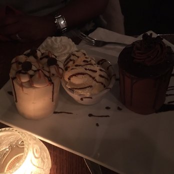 Log Cabin Steakhouse - Chocolate tower cake and the peanut butter tower cake served with vanilla ice cream and whipped cream. - Seafood Near Me - Galena, Illinois Log Cabin Steakhouse - Chocolate tower cake and the peanut butter tower cake served with vanilla ice cream and whipped cream. - Seafood Near Me - Galena, Illinois