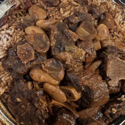 Best Caribbean Restaurant & Grill - Large oxtail over rice & peas