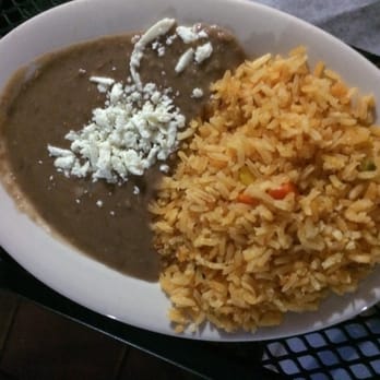 Tacos Cancun - Generous portion of rice and refried beans that accompanies the Gringa. - Mexican Near Me - Lambertville, New Jersey Tacos Cancun - Generous portion of rice and refried beans that accompanies the Gringa. - Mexican Near Me - Lambertville, New Jersey