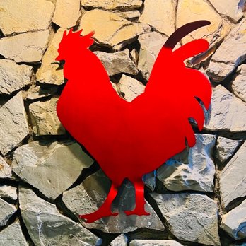 The Roost - a red rooster on a stone wall - Thai Near Me - Los Angeles, California The Roost - a red rooster on a stone wall - Thai Near Me - Los Angeles, California