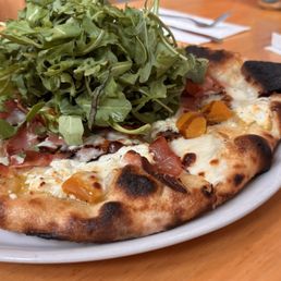 Pizza had roasted beets, goat cheese, prosciutto and the obvious arugula. They topped with balsamic drizzle Pizza had roasted beets, goat cheese, prosciutto and the obvious arugula. They topped with balsamic drizzle