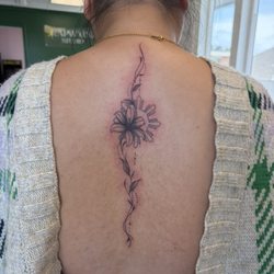 Spine tattoo by Kristina